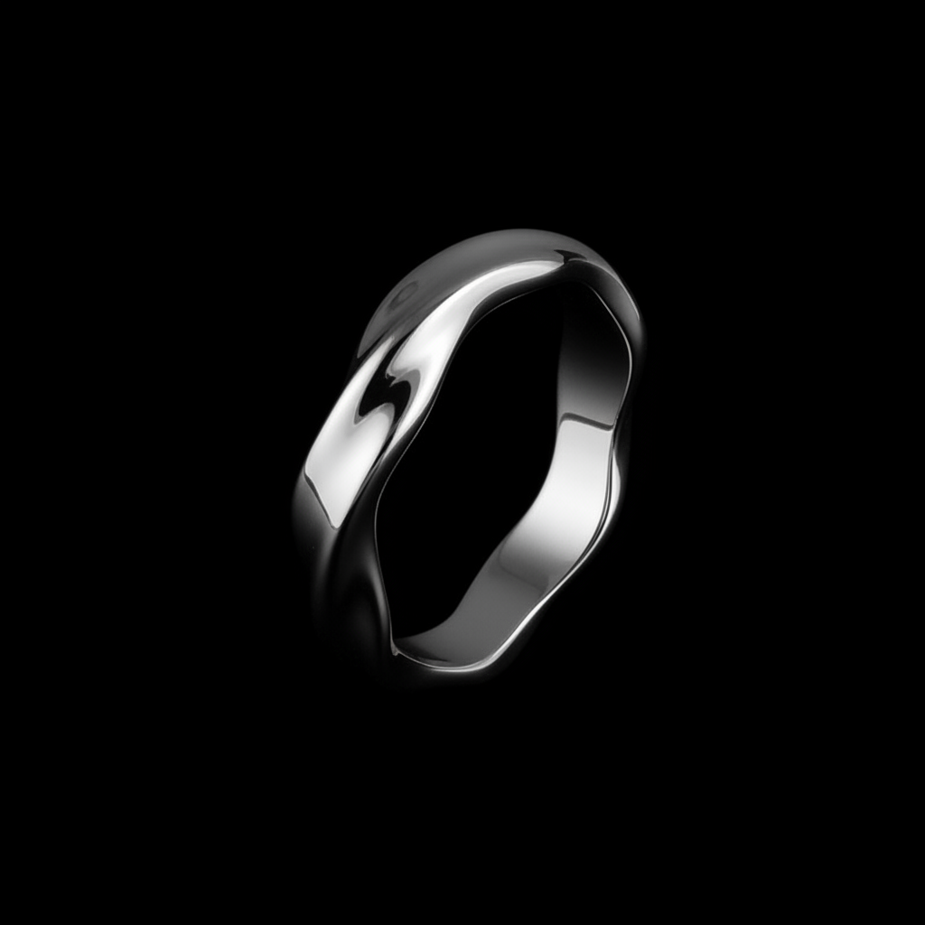 Matte silver Mobius twist ring on a black background