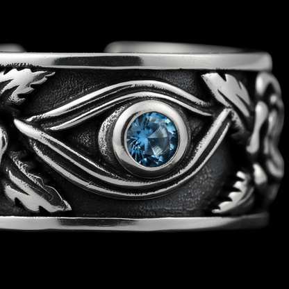 Macro close-up of the carved eye and blue stone