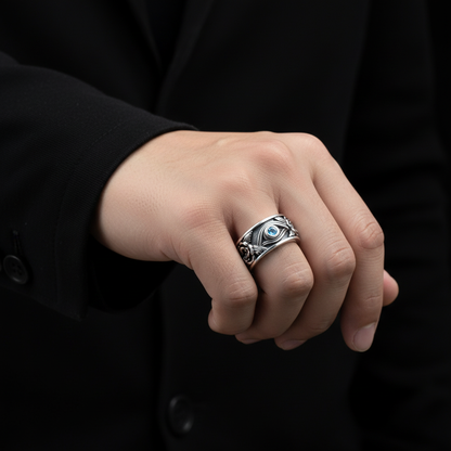 Eye of Horus ring worn on a man's finger
